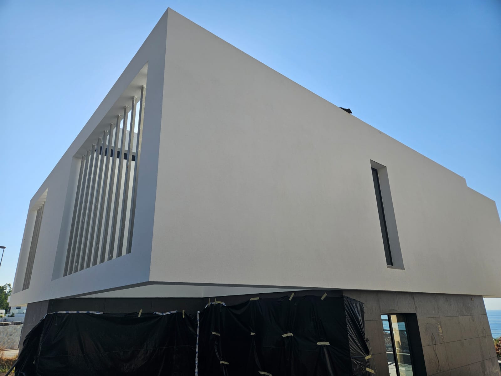 Arkitech3 SATE en fachada sobre casa modular de ARKITECH en Benalmádena